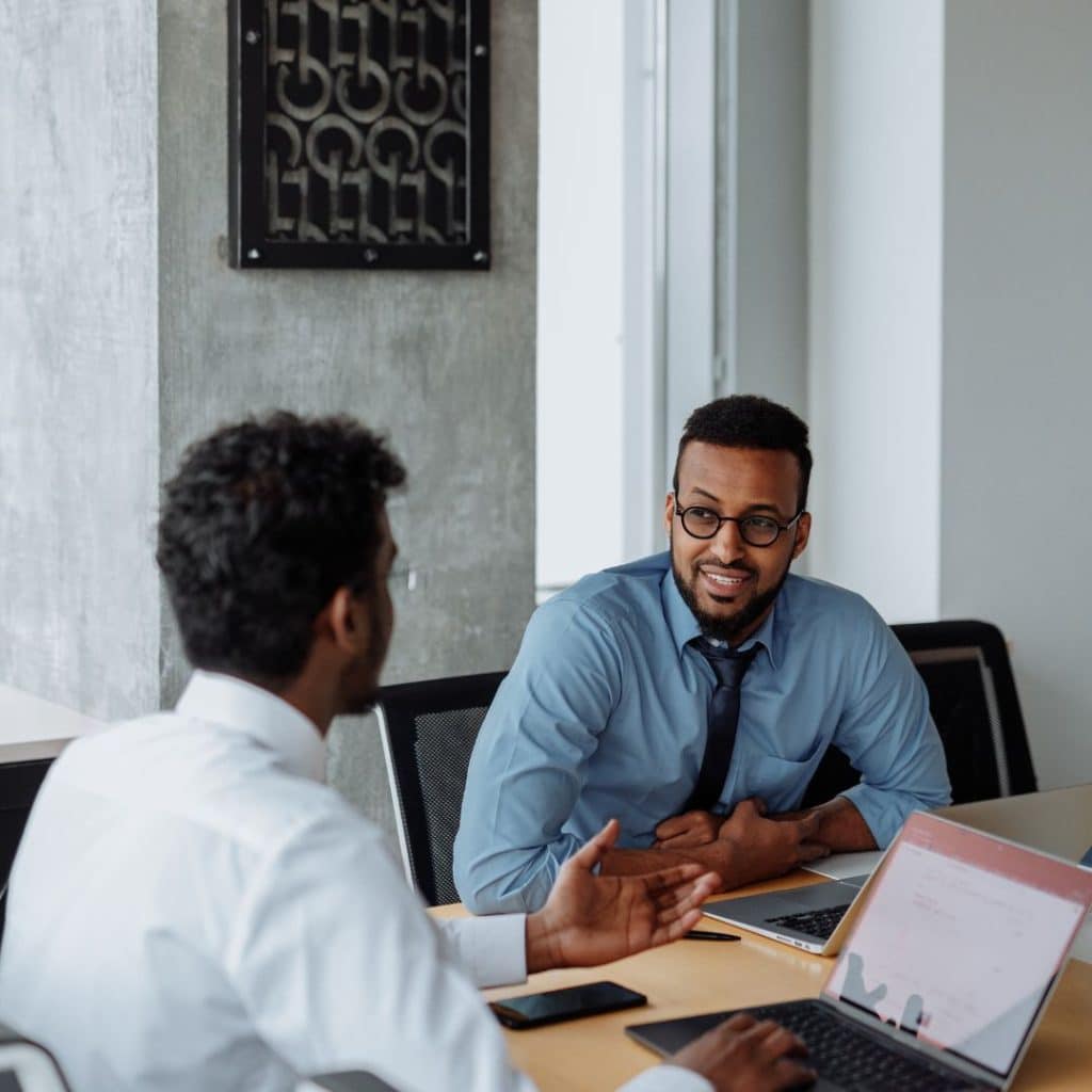 Two men having a business meeting in a modern office