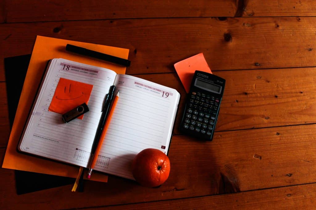 A Calculator On A Desk